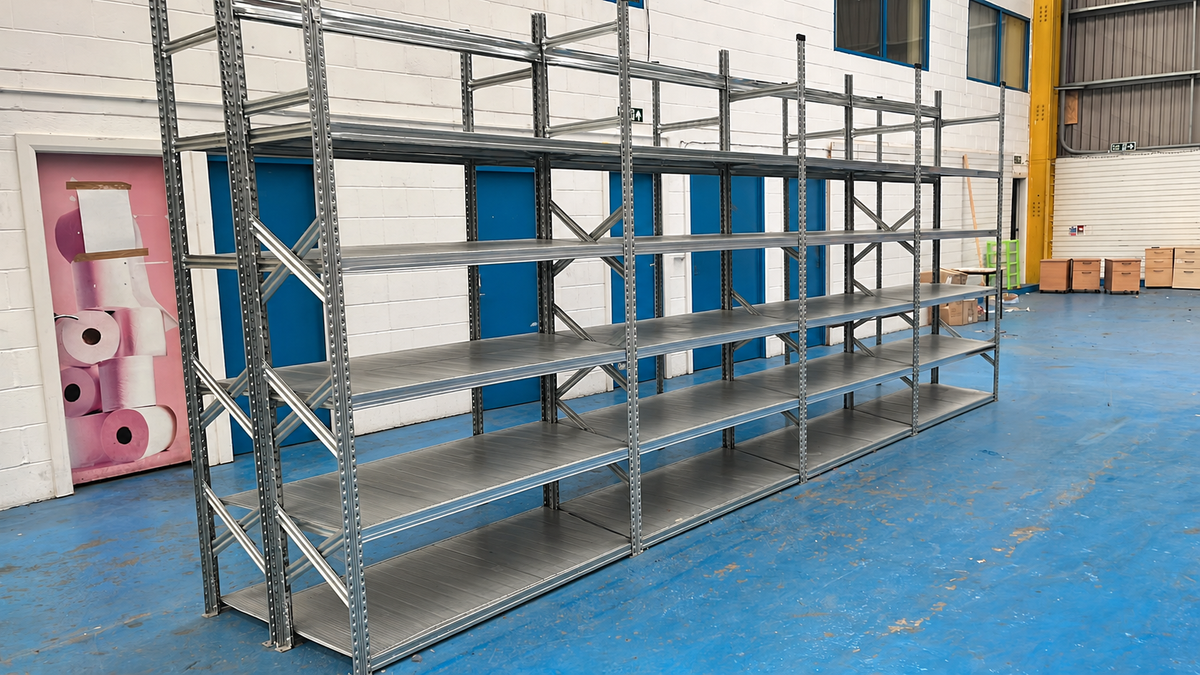 Used Metalsistem shelving with 4 joined bays and 20 metal shelves, 3m tall and 800mm deep